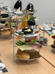 a group of plates of food on a table at Hotel im Homburger Ländchen in Nümbrecht