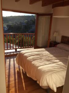 Posteľ alebo postele v izbe v ubytovaní Casa pareada en Ger con excelentes vistas