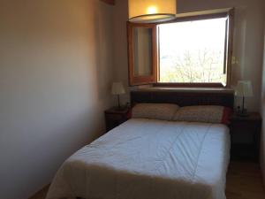 Posteľ alebo postele v izbe v ubytovaní Casa pareada en Ger con excelentes vistas