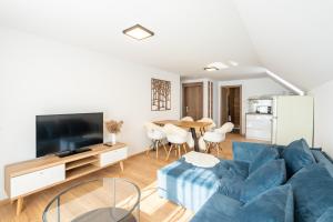 A television and/or entertainment centre at Apartmány Oravskie