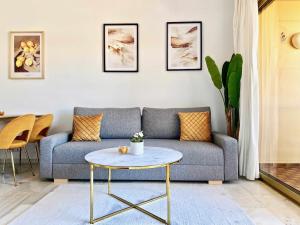 Część wypoczynkowa w obiekcie 797 Holiday Rentals- Apartamento en Sunset frente al mar