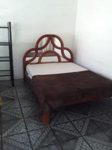 Llit o llits en una habitació de Helena aluguéis Lagoa da Conceição