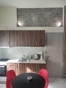 Kuchyň nebo kuchyňský kout v ubytování GCM 2 ROOMS kentro