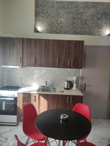 Kuchyň nebo kuchyňský kout v ubytování GCM 2 ROOMS kentro