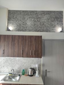 Kuchyň nebo kuchyňský kout v ubytování GCM 2 ROOMS kentro