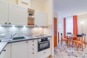 Kuchyň nebo kuchyňský kout v ubytování Villa Seestern Whg_ 770