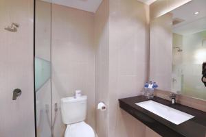 Koupelna v ubytování Hotel NEO+ Kuta Legian by ASTON