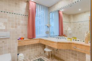 Ein Badezimmer in der Unterkunft Villa Elfeld 2 Whg. 717