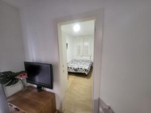 Postel nebo postele na pokoji v ubytování Habitaciones con baño compartido en bonito Apartamento en Badalona
