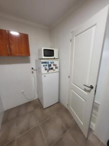Kuchyň nebo kuchyňský kout v ubytování Habitaciones con baño compartido en bonito Apartamento en Badalona