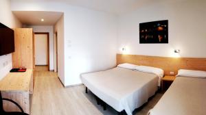 Posteľ alebo postele v izbe v ubytovaní Hotel Cantaleone