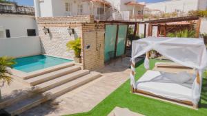 Bazén v ubytování Hotel Boutique Don Pepe nebo v jeho okolí