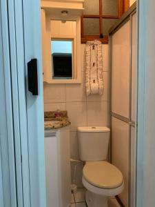 Un baño de Apartamento com ótima localização em Capão da Canoa