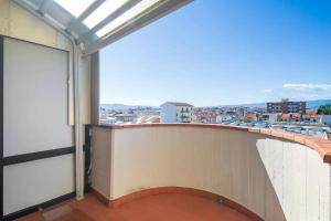 a balcony with a view of a city at SUITE con 2 Balconi - 6 Guest in Prato