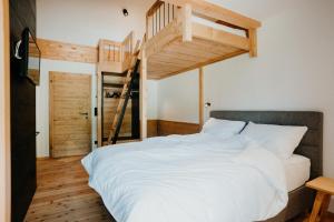 Łóżko lub łóżka w pokoju w obiekcie Chalet Knappenhütte