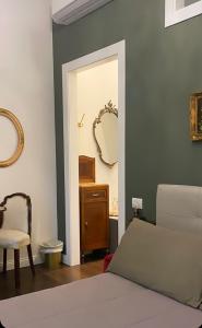 Voodi või voodid majutusasutuse Ortigia Twin Rooms toas