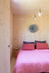 Ein Bett oder Betten in einem Zimmer der Unterkunft Casa Ladoit - maison d'architecte vue sur vignes