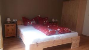 A bed or beds in a room at Loretz Luzia