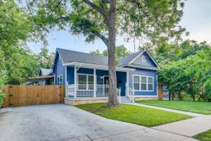 a blue house with a fence at NEW 4 BDRM Home off St Mary’s Mins To Pearl/River! in San Antonio