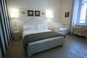A bed or beds in a room at Ca' de Tobia