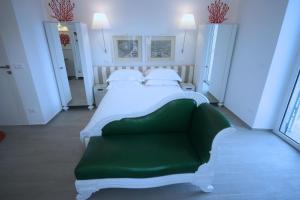 A bed or beds in a room at Ca' de Tobia
