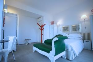 A bed or beds in a room at Ca' de Tobia