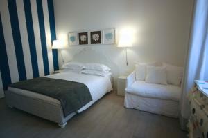 A bed or beds in a room at Ca' de Tobia