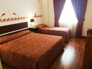Кровать или кровати в номере Chocohotel