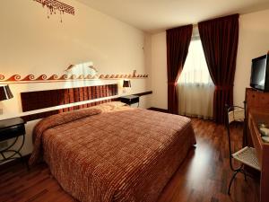 Кровать или кровати в номере Chocohotel
