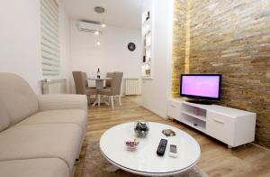 Μια τηλεόραση ή/και κέντρο ψυχαγωγίας στο Apartment Div 1