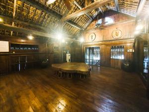 a large room with a table in the middle of it at Phủ Giáng Vân Homestay Sapa in Sapa