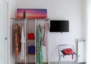 TV a/nebo společenská místnost v ubytování Ammore