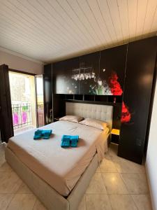 Postel nebo postele na pokoji v ubytování Appartamento Tropheum