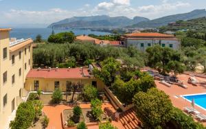 an aerial view of a resort with a pool at Hotel Villa Igea in Sorrento