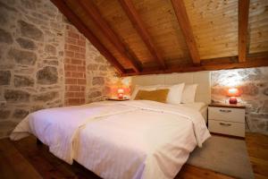 Posteľ alebo postele v izbe v ubytovaní Stone House Marino