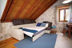 Posteľ alebo postele v izbe v ubytovaní Stone House Marino