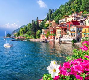 a view of a town next to the water with flowers at Alto Perledo in Perledo