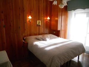 מיטה או מיטות בחדר ב-Albergo Generale Cantore - Monte Amiata