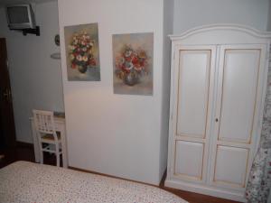 A bed or beds in a room at Albergo Generale Cantore - Monte Amiata