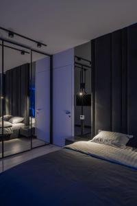 Postel nebo postele na pokoji v ubytování The Penthouse Kyiv