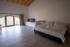 Ένα ή περισσότερα κρεβάτια σε δωμάτιο στο Agriturismo Ponte Florio