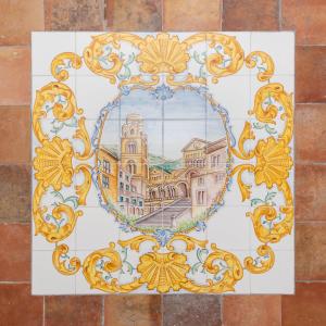 a tile floor with a drawing of a building at Amalfi Ammorè in Amalfi