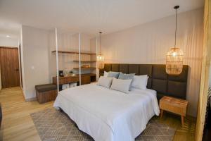 Ένα ή περισσότερα κρεβάτια σε δωμάτιο στο Hotel Salento Real Eje Cafetero
