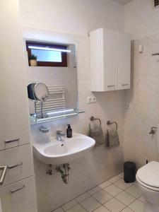 Koupelna v ubytování Sky & Sand Homes Nordsee by Nature I Boxspringbett, Terrasse, Zentral, Nah am Deich