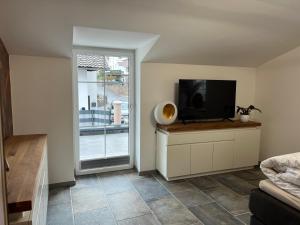 Telewizja i/lub zestaw kina domowego w obiekcie Ferienwohnung Krallinger