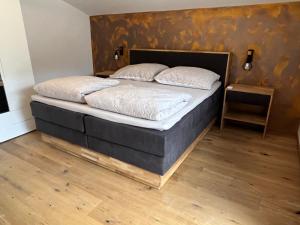 Łóżko lub łóżka w pokoju w obiekcie Ferienwohnung Krallinger