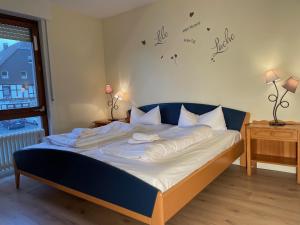 Postel nebo postele na pokoji v ubytování Haus Merian