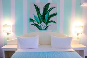 Letto o letti in una camera di Ocean Point Beach Resort & Spa Adults Only