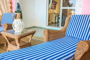 Area soggiorno di Ocean Point Beach Resort & Spa Adults Only