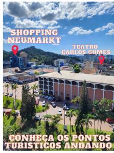 um cartaz para um centro comercial numa cidade em Hotel Europa em Blumenau